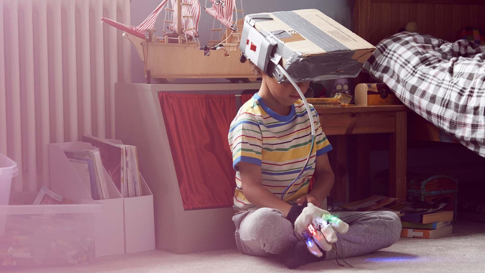 Child playing with science project